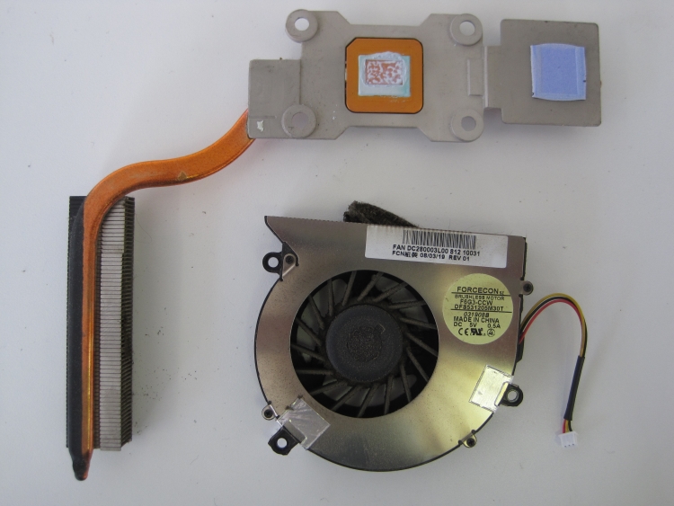 Acer Aspire 5315 heat sink and fan showing dust and dried thermal paste on heat sink